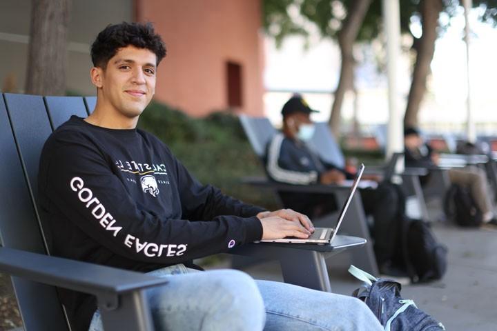 A student sitting in a chair. 